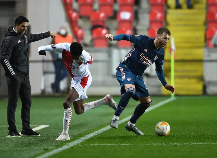 Framed Print : Arsenal's Calum Chambers Faces Off Against Slavia Praha's Peter Olayinka in UEFA Europa League Quarterfinal Framed Print : Arsenal's Calum Chambers Faces Off Against Slavia Praha's Peter Olayinka in UEFA Europa League Quarterfinal