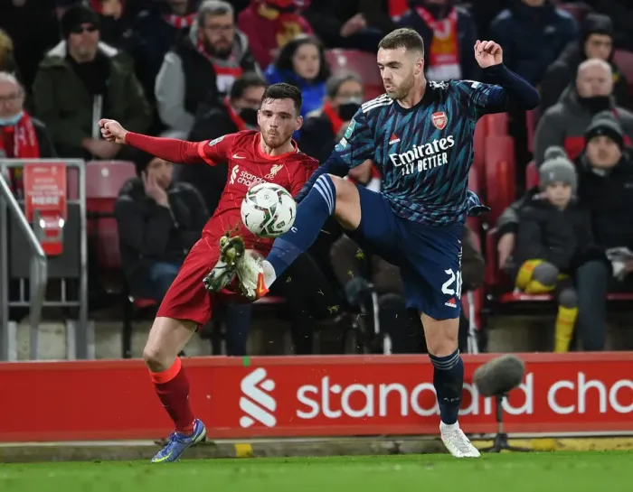 Framed Print : Arsenal's Calum Chambers Faces Pressure from Liverpool's Andrew Robertson in Carabao Cup Semi-Final Clash Framed Print : Arsenal's Calum Chambers Faces Pressure from Liverpool's Andrew Robertson in Carabao Cup Semi-Final Clash