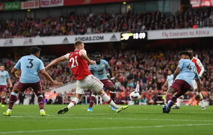 Framed Print : Arsenal's Calum Chambers Scores Second Goal Against Aston Villa in 2019-20 Premier League