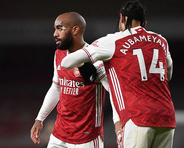 Arsenal's Captain Transfer: Aubameyang Passes Armband to Lacazette during Empty Emirates Stadium Showdown (Arsenal v Liverpool, 2021)