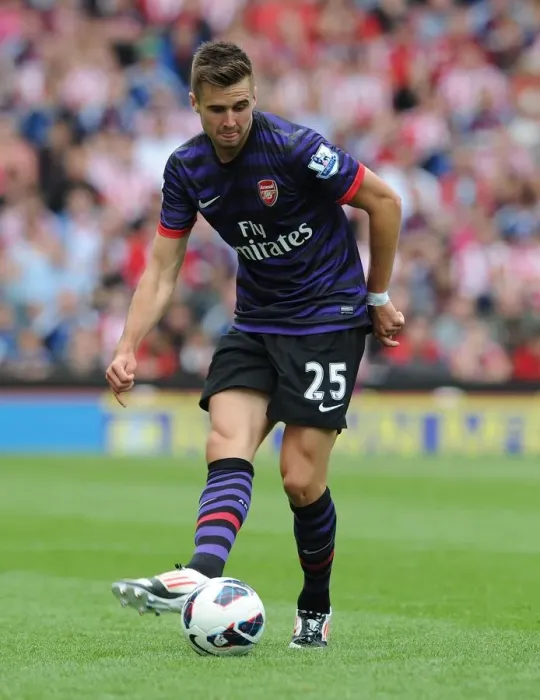 Framed Print : Arsenal's Carl Jenkinson Faces Off Against Stoke City in 2012-13 Premier League Clash Framed Print : Arsenal's Carl Jenkinson Faces Off Against Stoke City in 2012-13 Premier League Clash