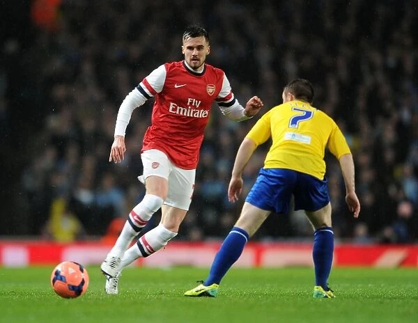 Arsenal's Carl Jenkinson Fends Off Coventry's John Fleck in FA Cup Clash