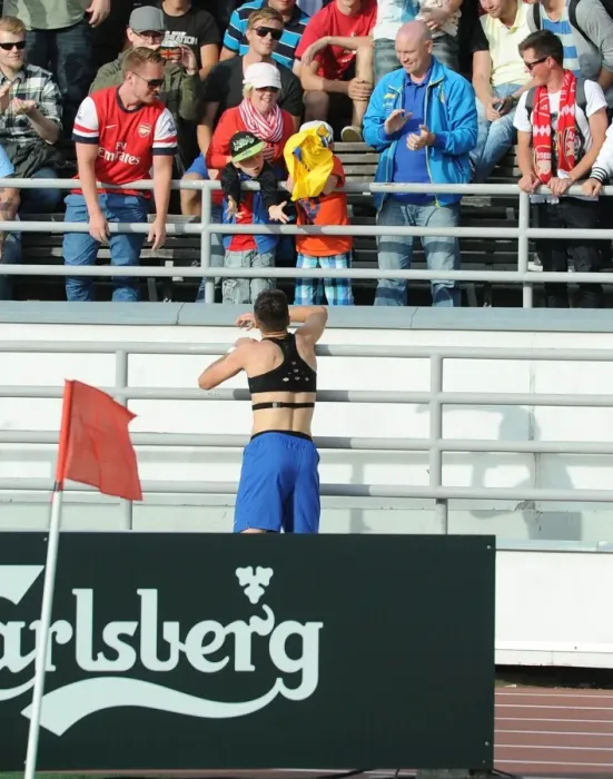 Framed Print : Arsenal's Carl Jenkinson Shows Sportsmanship by Throwing Shirt to Ecstatic Fan after Arsenal vs. Manchester City Pre-Season Match, Helsinki 2013