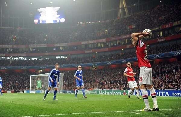 Arsenal's Carl Jenkinson Takes a Throw-In during UEFA Champions League Match against Schalke 04 (2012-13)