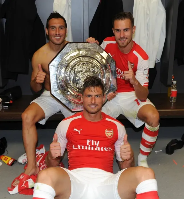 Framed Print : Arsenal's Cazorla, Giroud, and Ramsey Celebrate FA Community Shield Victory over Manchester City Framed Print : Arsenal's Cazorla, Giroud, and Ramsey Celebrate FA Community Shield Victory over Manchester City