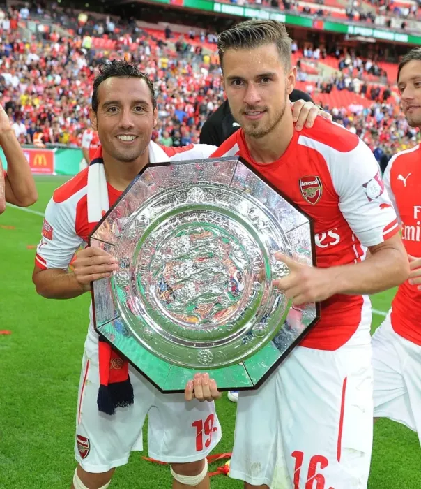 Framed Print : Arsenal's Cazorla and Ramsey Celebrate FA Community Shield Victory over Manchester City