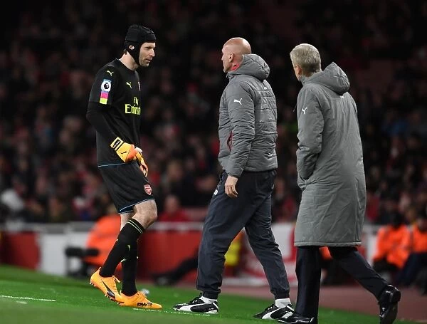 Arsenal's Cech, Bould, and Wenger: Deep in Thought during Arsenal v Leicester City Match