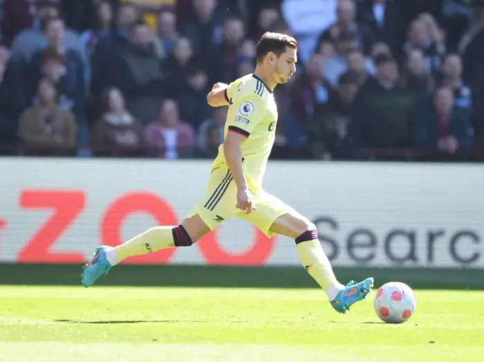 Framed Print : Arsenal's Cedric Faces Off Against Aston Villa in Premier League Clash