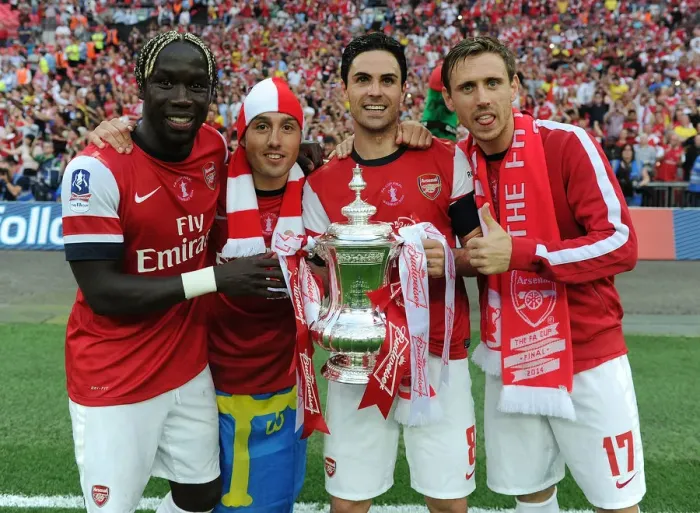 Framed Print : Arsenal's Celebratory Moment: Santi Cazorla, Mikel Arteta, Bacary Sagna, and Nacho Monreal Rejoice after FA Cup Victory over Hull City (2014) Framed Print : Arsenal's Celebratory Moment: Santi Cazorla, Mikel Arteta, Bacary Sagna, and Nacho Monreal Rejoice after FA Cup Victory over Hull City (2014)
