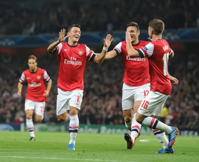 Framed Print : Arsenal's Champions League Triumph: Ozil, Giroud, Ramsey's Goal Celebration (2013-14)