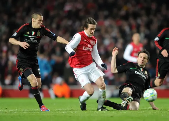 Framed Print : Arsenal's Champions League Triumph: Rosicky's Brilliance in Arsenal's 3-0 Win over AC Milan Framed Print : Arsenal's Champions League Triumph: Rosicky's Brilliance in Arsenal's 3-0 Win over AC Milan