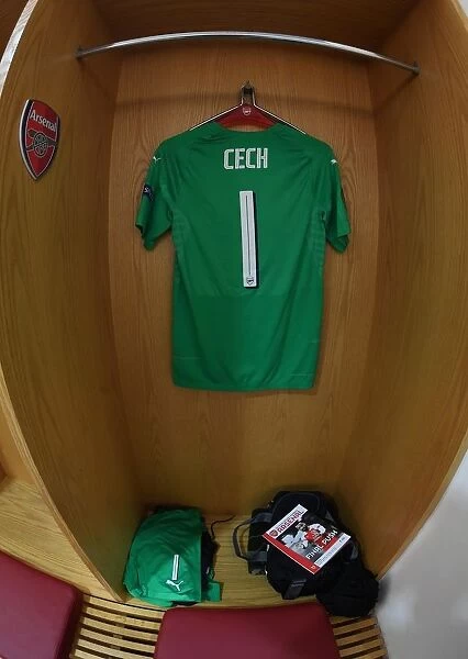 Arsenal's Empty Changing Room: Petr Cech's Shirt Hangs Awaiting Europa League Semi-Final Battle Against Valencia