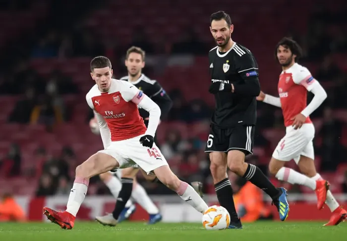 Framed Print : Arsenal's Charlie Gilmour Closes Down Qarabag's Simeon Slavchev in Europa League Clash Framed Print : Arsenal's Charlie Gilmour Closes Down Qarabag's Simeon Slavchev in Europa League Clash