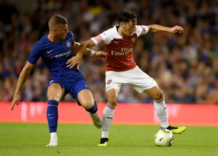 Framed Print : Arsenal's Clash of Talents: Ozil vs. Barkley (2018) - Pre-Season Showdown against Chelsea