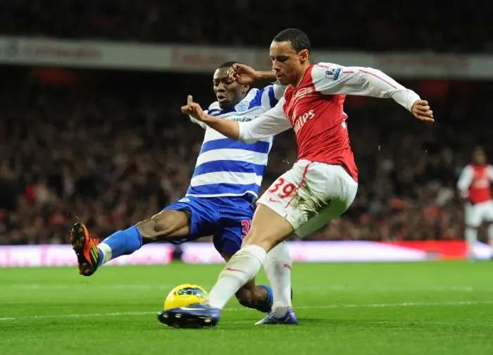 Framed Print : Arsenal's Coquelin Clashes with QPR's Wright-Phillips in Premier League Showdown