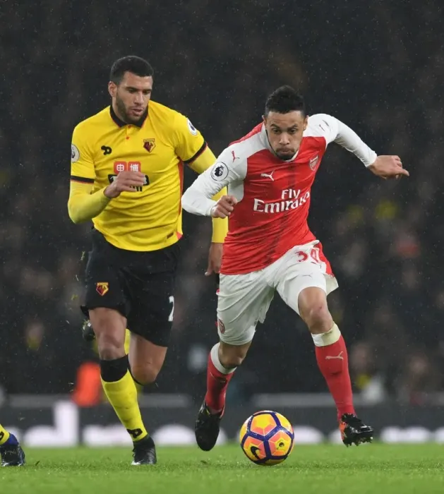 Framed Print : Arsenal's Coquelin Outmaneuvers Watford's Capoue in Premier League Clash
