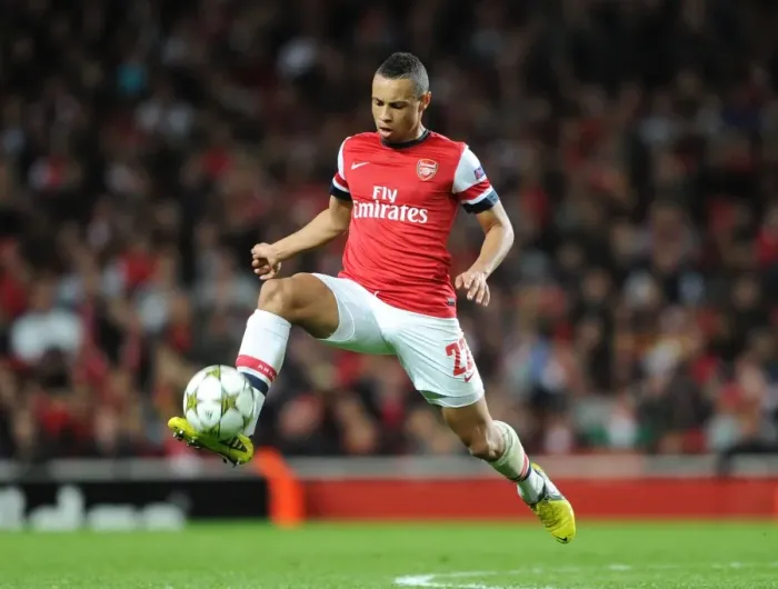 Framed Print : Arsenal's Coquelin Shines: 3-1 Victory Over Olympiacos in Champions League Group B at Emirates Stadium