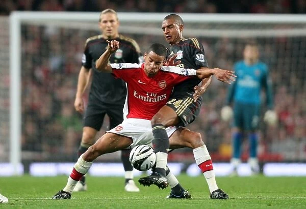 Arsenal's Craig Eastmond vs. Liverpool's David Ngog: A Clash in the Carling Cup, Arsenal 2:1