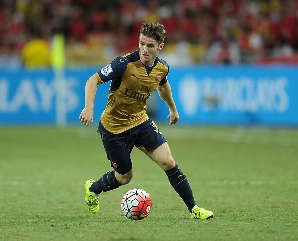 Arsenal's Dan Crowley in Action against Singapore XI during Barclays Asia Trophy