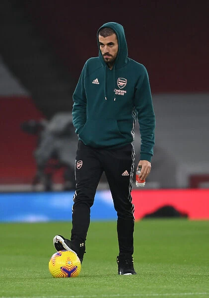 Arsenal's Dani Ceballos Prepares for Wolverhampton Wanderers Clash in Empty Emirates Stadium (2020-21 Premier League)