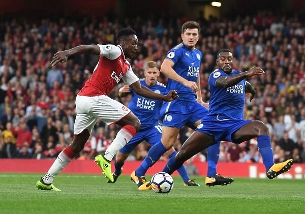 Arsenal's Danny Welbeck Clashes with Leicester's Wes Morgan in Premier League Showdown