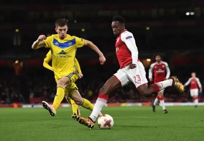 Framed Print : Arsenal's Danny Welbeck Faces Off Against BATE Borisov's Aleksei Rios Framed Print : Arsenal's Danny Welbeck Faces Off Against BATE Borisov's Aleksei Rios