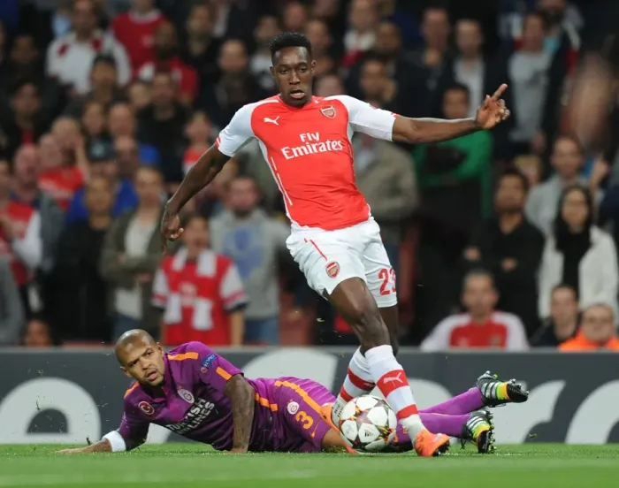 Framed Print : Arsenal's Danny Welbeck Outwits Felipe Melo in Electrifying Champions League Clash