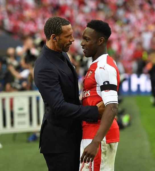 Arsenal's Danny Welbeck and Rio Ferdinand Share a Moment after FA Cup Final Victory
