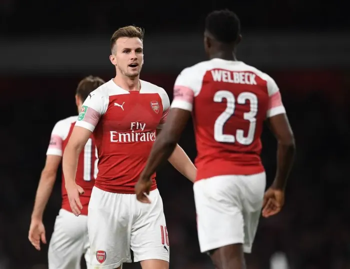 Framed Print : Arsenal's Danny Welbeck and Rob Holding Celebrate First Goal vs. Brentford in Carabao Cup Framed Print : Arsenal's Danny Welbeck and Rob Holding Celebrate First Goal vs. Brentford in Carabao Cup