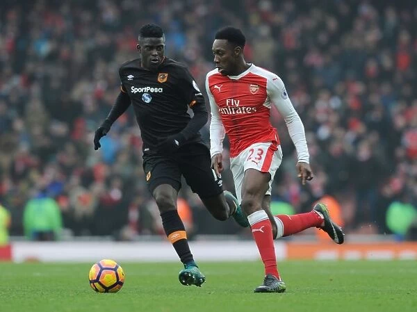 Arsenal's Danny Welbeck Scores Past Hull City's Alfred N'Diaye in Premier League Clash