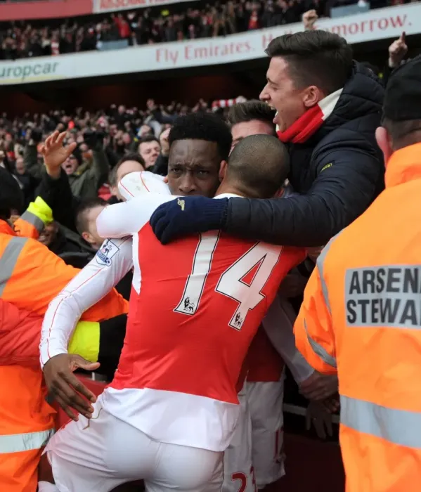 Framed Print : Arsenal's Danny Welbeck Scores Second Goal Against Leicester City in Premier League 2015-16: Celebrating with Theo Walcott and Fans Framed Print : Arsenal's Danny Welbeck Scores Second Goal Against Leicester City in Premier League 2015-16: Celebrating with Theo Walcott and Fans