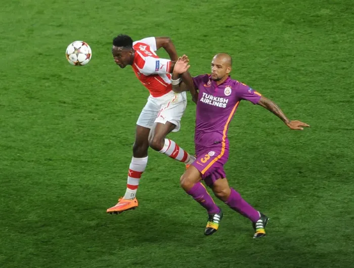 Framed Print : Arsenal's Danny Welbeck vs. Felipe Melo: A Champions League Battle Framed Print : Arsenal's Danny Welbeck vs. Felipe Melo: A Champions League Battle