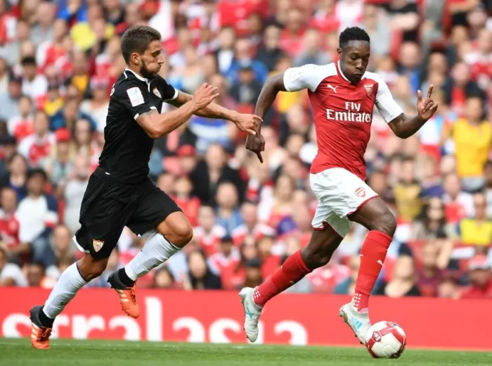 Framed Print : Arsenal's Danny Welbeck vs. Sevilla's Daniel Carrico: Emirates Cup Battle Framed Print : Arsenal's Danny Welbeck vs. Sevilla's Daniel Carrico: Emirates Cup Battle