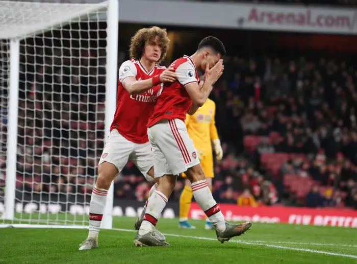 Framed Print : Arsenal's David Luiz Consoles Injured Gabriel Martinelli vs Sheffield United (2019-20)