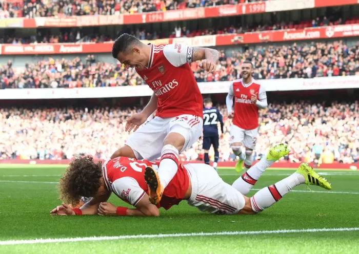 Framed Print : Arsenal's David Luiz and Granit Xhaka Celebrate Goal Against AFC Bournemouth, Premier League 2019-20