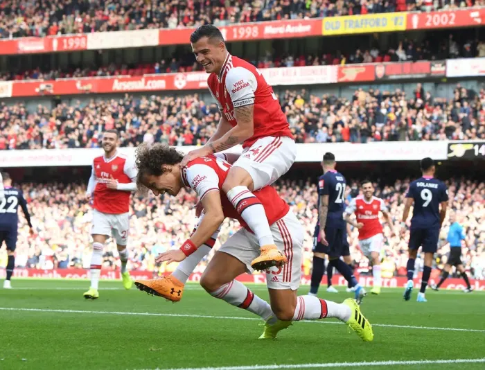 Framed Print : Arsenal's David Luiz and Granit Xhaka: Celebrating a Goal Against AFC Bournemouth, Premier League 2019-20 Framed Print : Arsenal's David Luiz and Granit Xhaka: Celebrating a Goal Against AFC Bournemouth, Premier League 2019-20