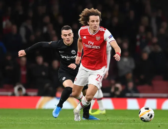 Framed Print : Arsenal's David Luiz Overpowers Eintracht Frankfurt's Filip Kostic in Europa League Clash