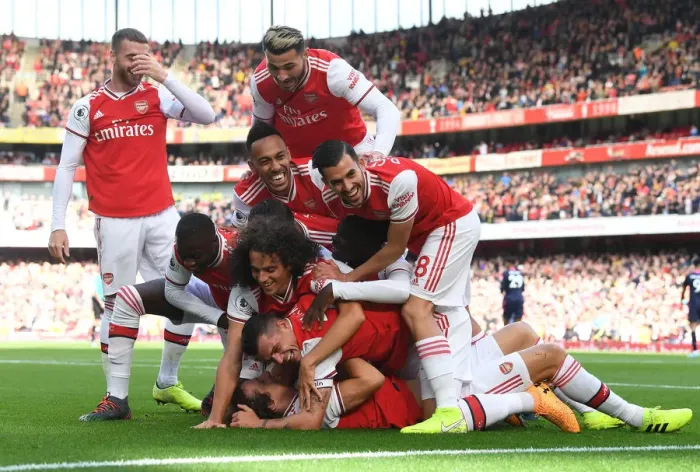 Framed Print : Arsenal's David Luiz Scores and Celebrates with Team against AFC Bournemouth in 2019-20 Premier League
