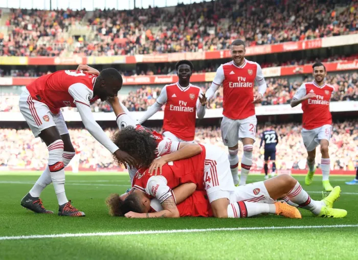 Framed Print : Arsenal's David Luiz Scores and Celebrates with Teammates against AFC Bournemouth (2019-20)