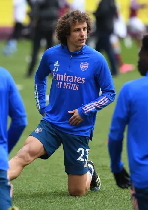 Framed Print : Arsenal's David Luiz Warms Up Ahead of Empty Turf Moor for Burnley Clash (Burnley v Arsenal 2021) Framed Print : Arsenal's David Luiz Warms Up Ahead of Empty Turf Moor for Burnley Clash (Burnley v Arsenal 2021)