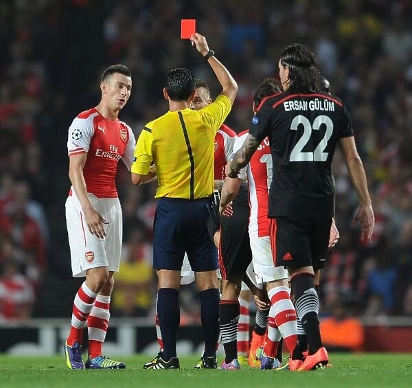 Arsenal's Debuchy Dismissed: Koscielny Looks On as Proenca Shows Red in Arsenal v Besiktas Clash