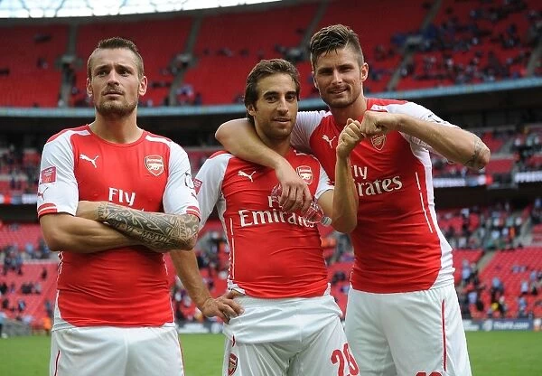 Arsenal's Debuchy, Flamini, and Giroud Celebrate FA Community Shield Victory over Manchester City