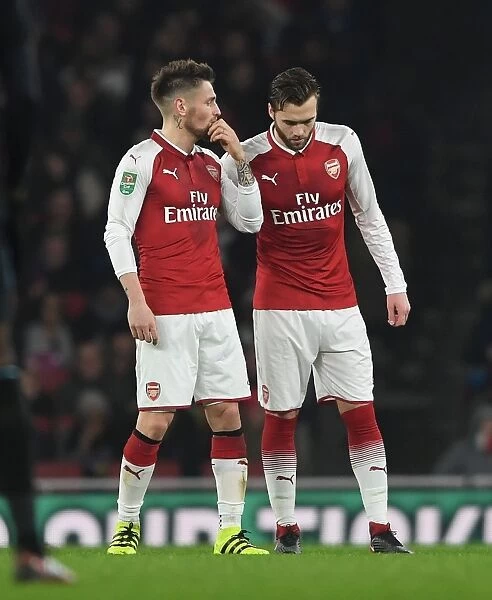 Arsenal's Debuchy Guides Chambers During Carabao Cup Clash vs. West Ham