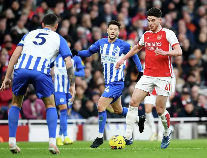 Framed Print : Arsenal's Declan Rice Outruns Brighton's Adam Lallana in 2023-24 Premier League Clash Framed Print : Arsenal's Declan Rice Outruns Brighton's Adam Lallana in 2023-24 Premier League Clash