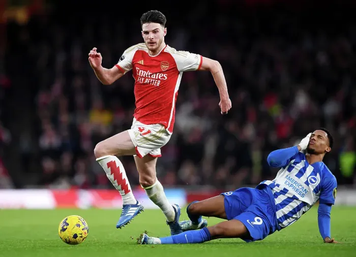 Framed Print : Arsenal's Declan Rice Outruns Brighton's Joao Pedro in 2023-24 Premier League Clash