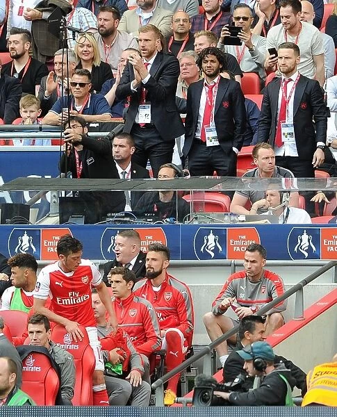 Arsenal's Defenders: Mertesacker, Elneny, and Mustafi in FA Cup Semi-Final Showdown Against Manchester City