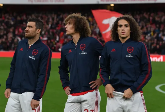 Framed Print : Arsenal's Defenders: Sokratis, Luiz, and Guendouzi Prepare for Crystal Palace Clash (Arsenal v Crystal Palace 2019-20)