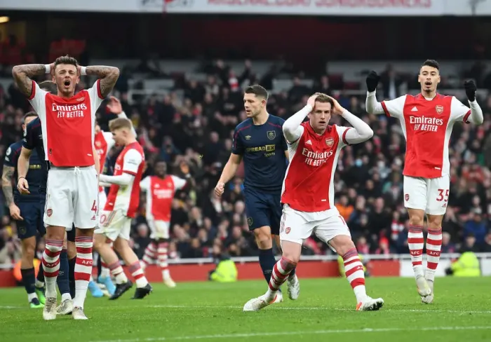 Framed Print : Arsenal's Defense Trio: White, Holding, and Martinelli in Action vs Burnley (2021-22)