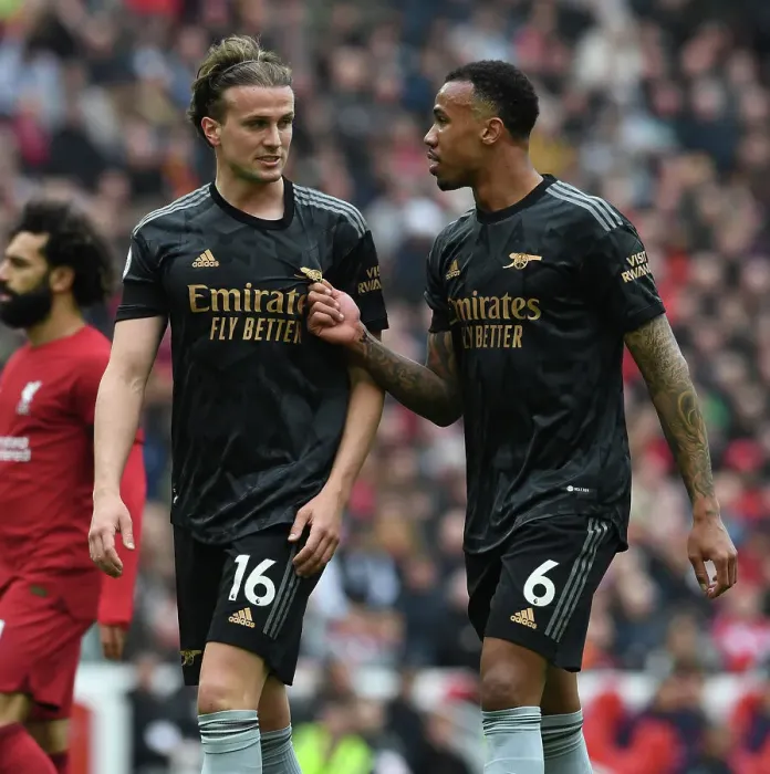 Framed Print : Arsenal's Defensive Showdown: Holding vs. Gabriel at Anfield (2022-23)