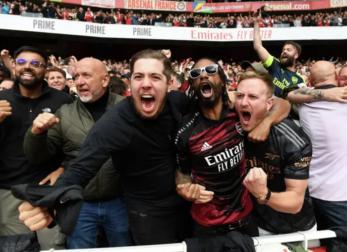Framed Print : Arsenal's Derby Triumph: Euphoric Fans Celebrate Victory over Tottenham, Premier League 2022-23